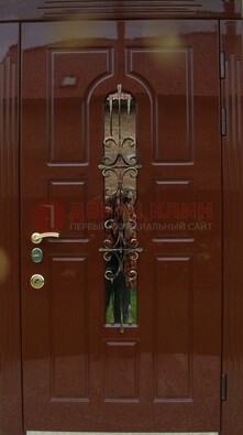 Красивая металлическая дверь со стеклом и ковкой ДСК-33 в Севастополе