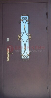 Металлическая дверь со стеклом и ковкой ДСК-77 в Ростове-На-Дону